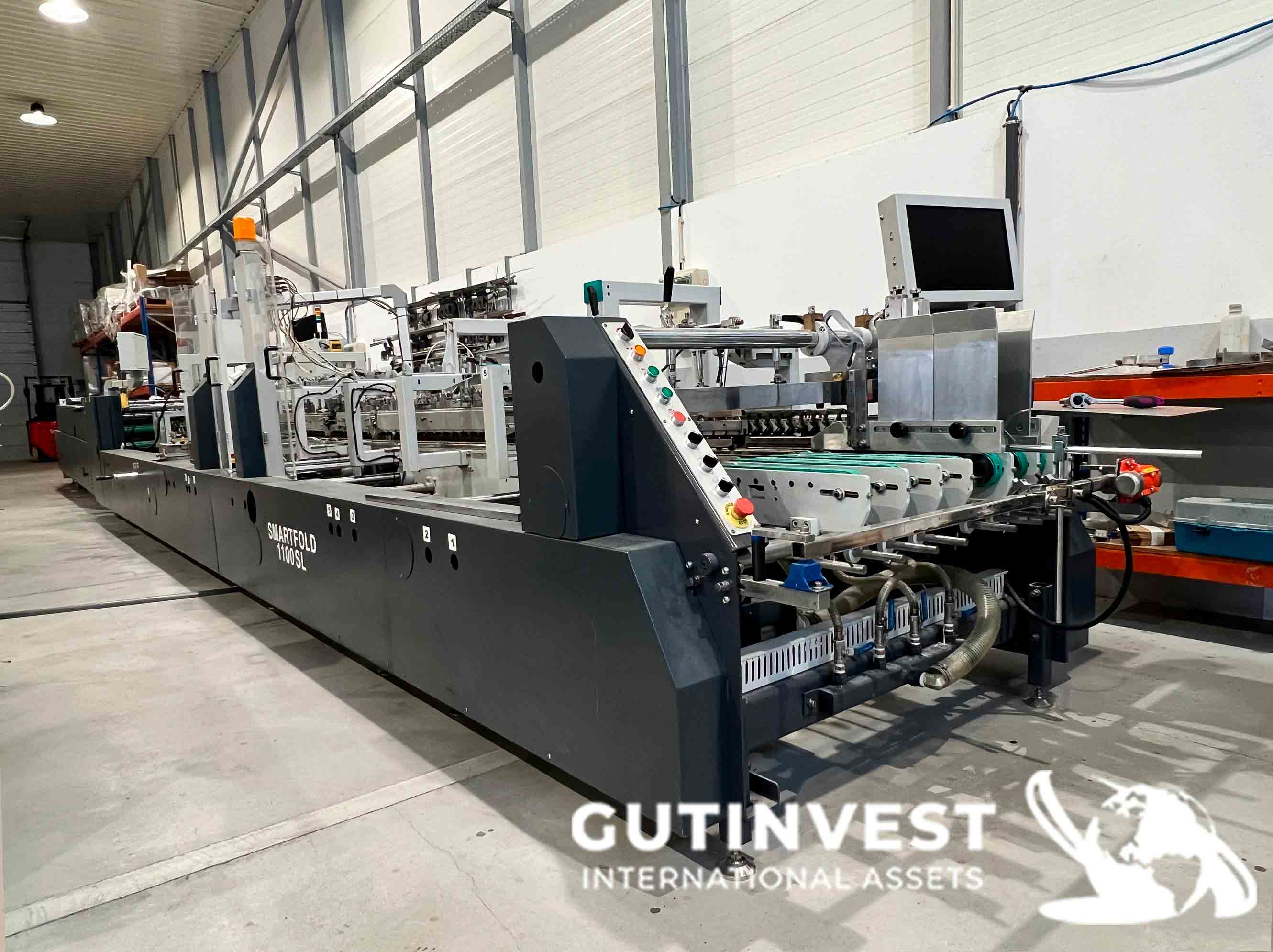 Máquina plegadora - encoladora de cajas