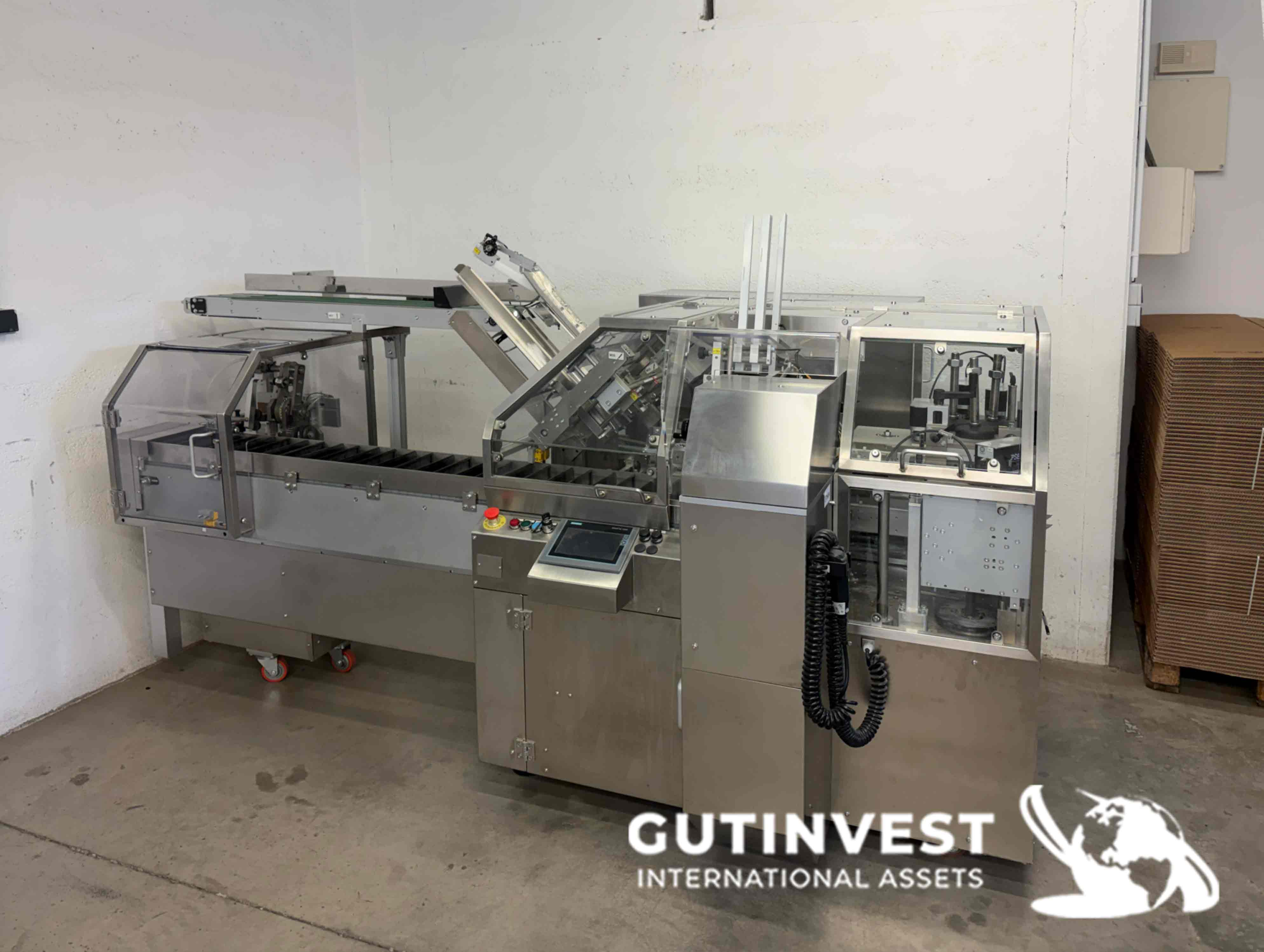 Cartoning machine for cosmetic and pharmaceutical products