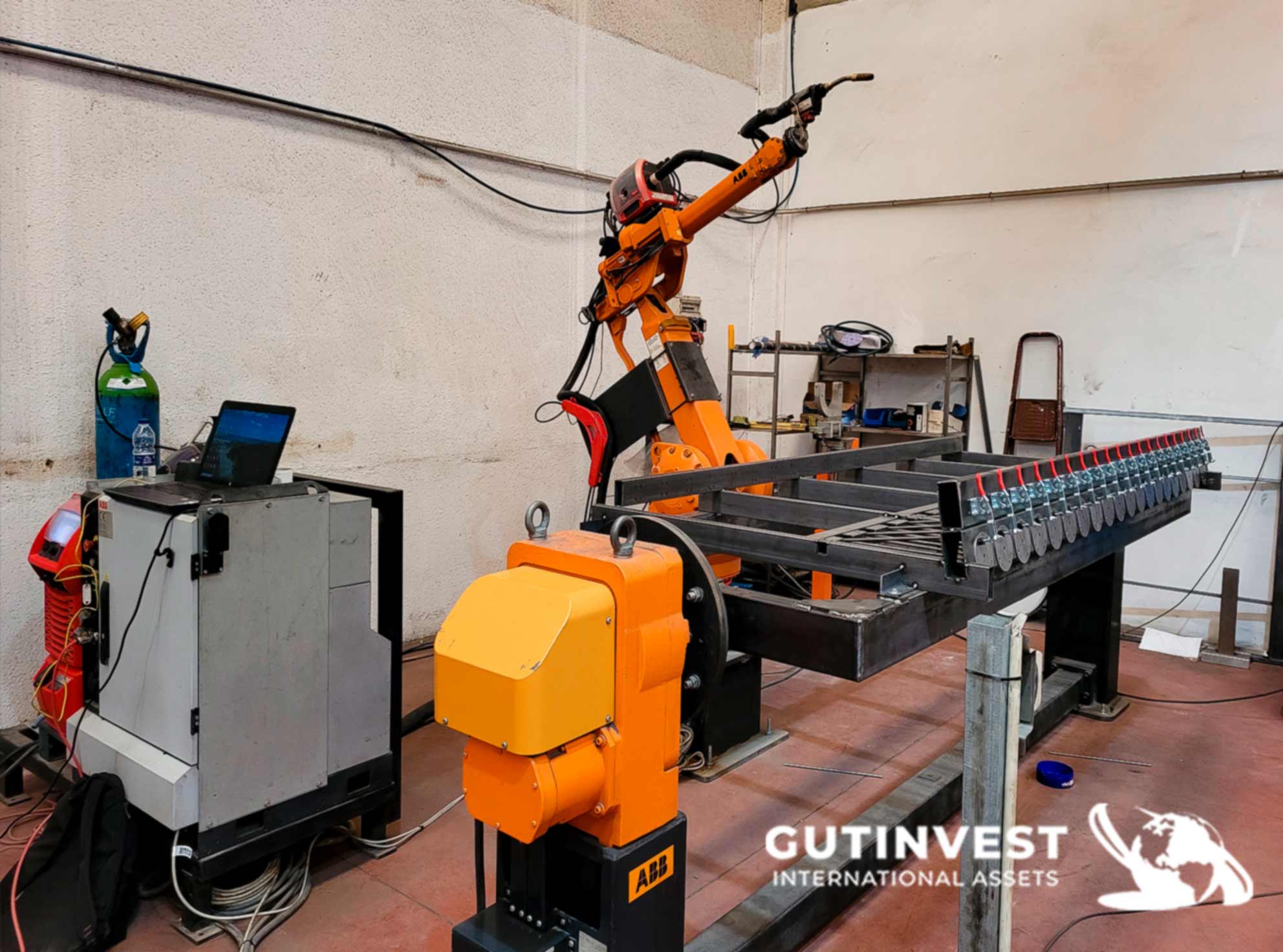 Welding robot with turn-over table