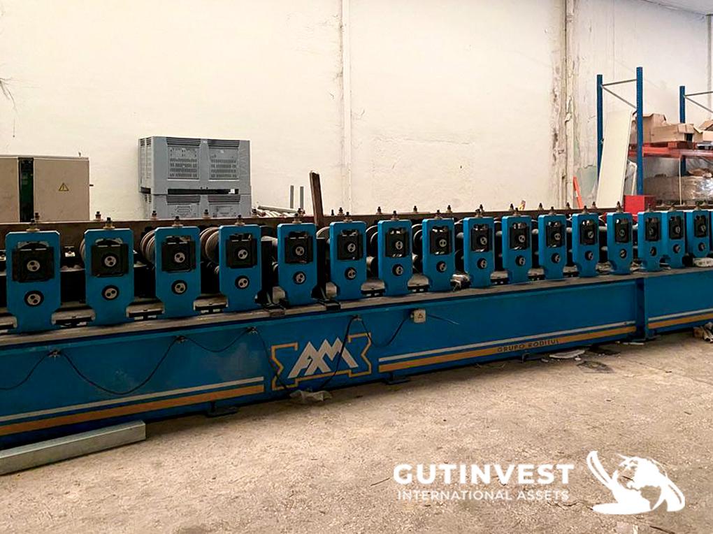 Sectional door rolling line - 24 heads