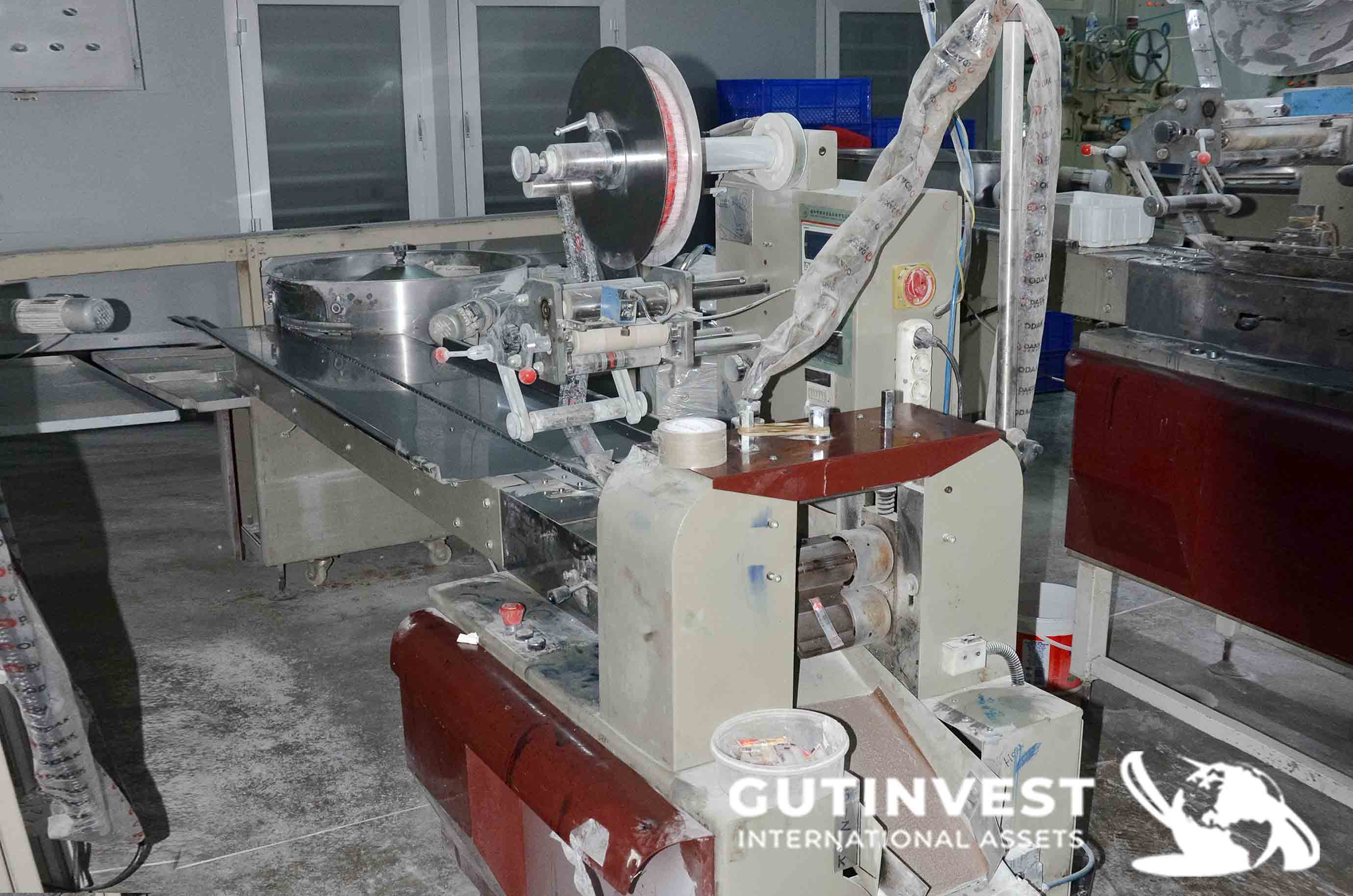 Máquina empacadora horizontal - Para empaquetar dulces.