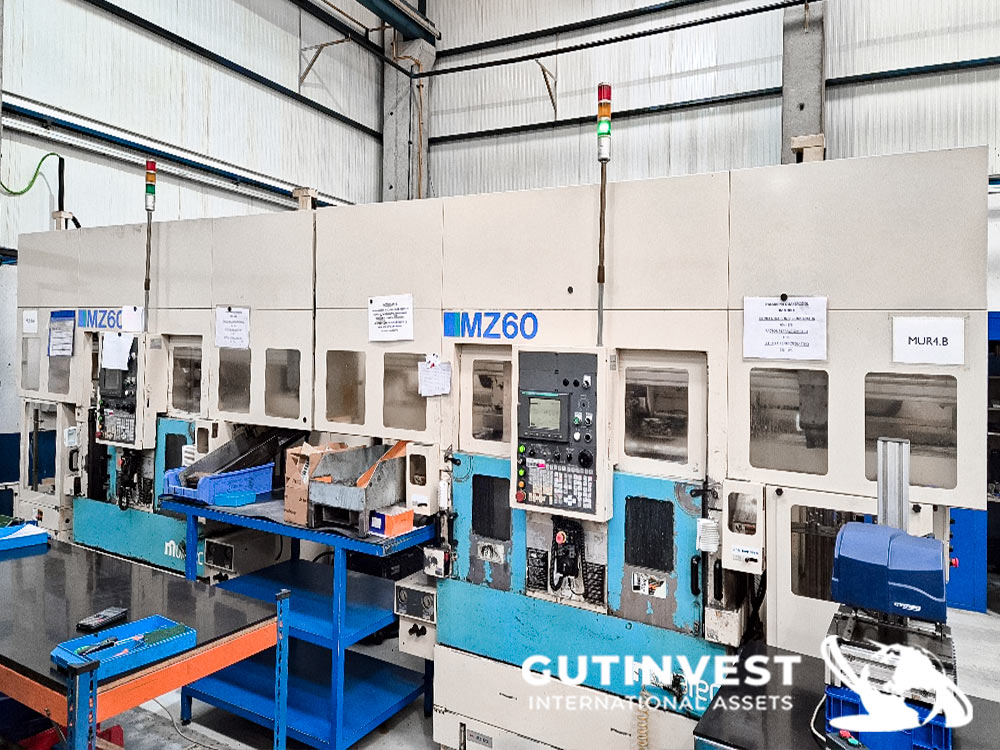 Twin spindle turning CNC chucker