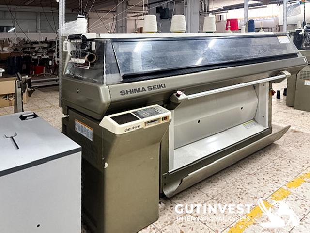 Máquina de tejer plana