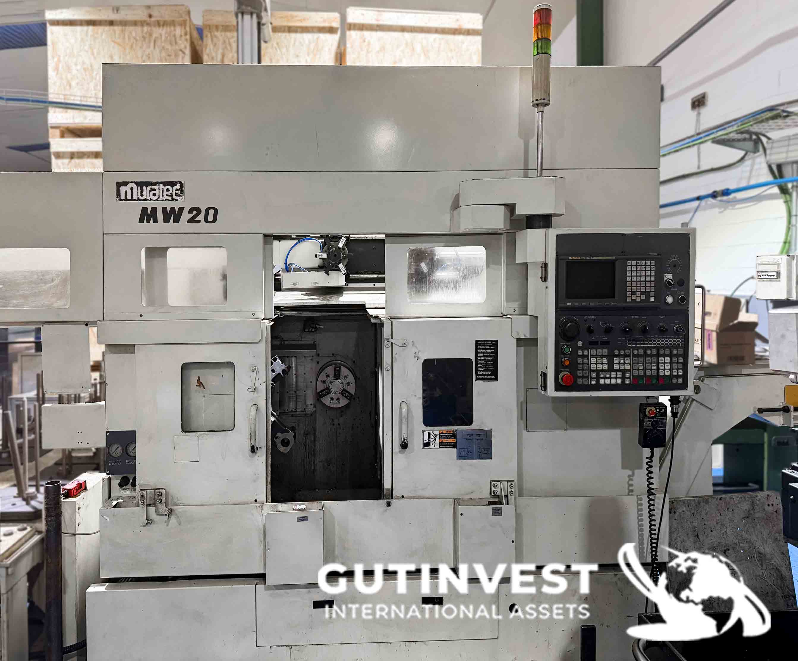 Torno doble cabezal con robot gantry