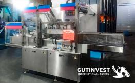 Sealing machinery for food products - 4 trays