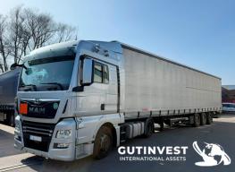 (x2) Camiones tauliner con plataforma elevadora "MAN"