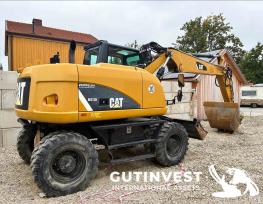 Wheeled hydraulic excavator "CATERPILLAR" M313D 