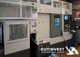 Torno CNC de 4 ejes con brazo robótico